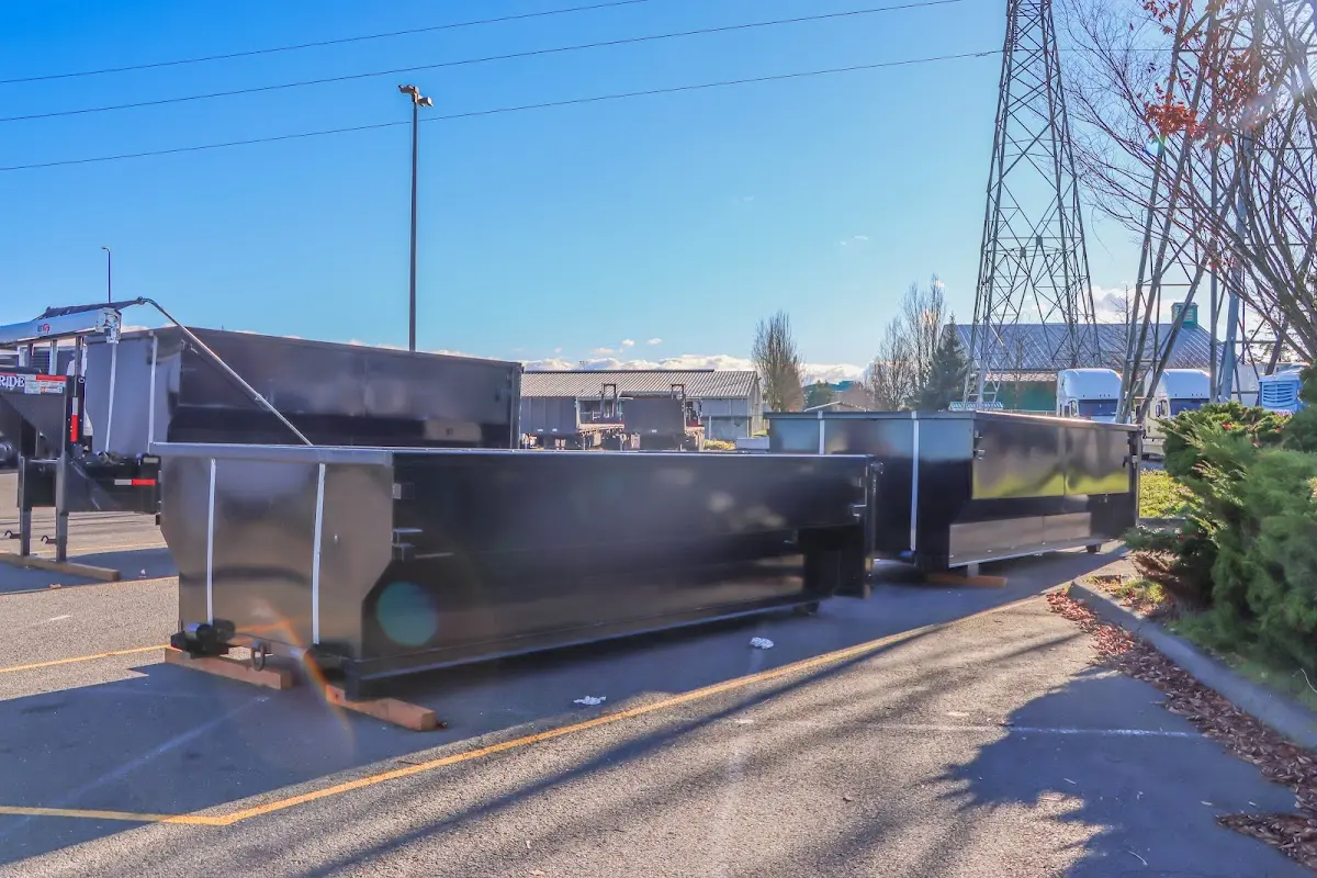 Roll-off dumpster ready for waste disposal at job site for 2 Yard Dumpster Rental in Jonesborough